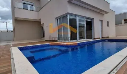 Casa de luxo em condomínio à venda em Americana-SP, com 4 quartos, 1 suíte, 2 salas, 3 banheiros e 2 vagas de garagem.