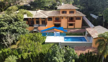 Casa Cinematográfica com 4 Suítes e Sala de Cinema - Granja Viana.
