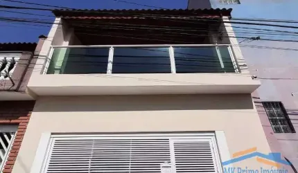 Excelente Casa Assobradada com 2 Dormitórios e 2 Vagas de Garagem.