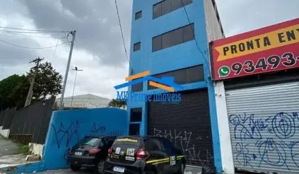 Prédio Comercial de 4 Andares com Salas Amplas e Vagas de Garagem.