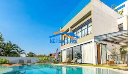 Casa Luxuosa com 3 Piscinas no Eco Boulevard - Jardim Petropólis/SP.