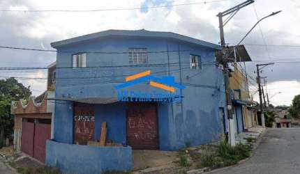 Oportunidade de Renda: Imóvel com 3 Casas e Salão Comercial - Bela Vista.
