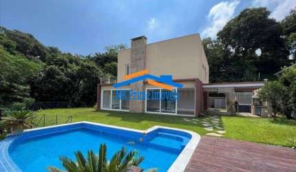 Casa em condomínio 1.249m² com 4 suítes no Cond. Pousada dos Bandeirantes.
