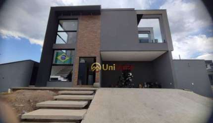 Sobrado com 4 dormitórios, 210 m² - venda por R$ 1.800.000,00 ou aluguel por R$ 8.580,00/mês - Condomínio Reserva Aruanã - São José dos Campos/SP