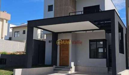 Casa com 3 dormitórios à venda, 134 m² por R$ 629.000 - Chácara Belo Horizonte - Taubaté/SP