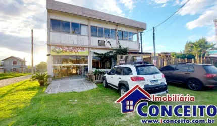 PC10 - Prédio comercial com apartamento localizado na avenida Principal