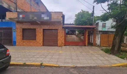 Casa com 3 dormitórios à venda, 220 m² por R$ 980.000,00 - Camboim - Sapucaia do Sul/RS