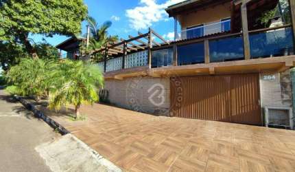 Casa com 4 dormitórios para alugar, 350 m² por R$ 5.070,00/mês - Camboim - Sapucaia do Sul/RS