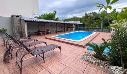 Casa com 4 quartos à venda na Avenida Governador Jorge Lacerda, 1964, Costeira do Pirajubaé, Florianópolis, 336 m2 por R$ 1.650.000