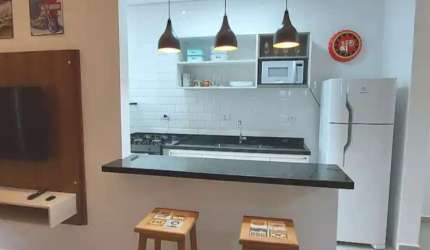 Apartamento mobiliado no quarto andar à venda no centro
