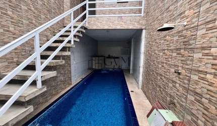 Casa de Condomínio com 3 dorms e piscina Maracanã, Praia Grande