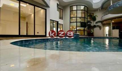 Luxuosa casa a venda no Swiss Park, Campinas-SP: 3 suítes, ampla área de convívio com piscina e 450 m² de área.