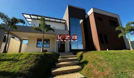 Casa de luxo à venda em condomínio exclusivo de Valinhos-SP: 4 suítes, 3 salas, 6 banheiros, 4 vagas de garagem, 483m².