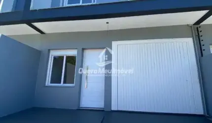 Casa com 3 quartos à venda na Inês Dagostinho Guioto, 803, Nossa Senhora das Graças, Caxias do Sul por R$ 399.900