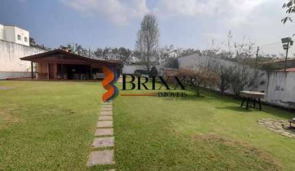 CASA TÉRREA Á VENDA DE MADEIRA COM 1.280 METROS DE ÁREA -COND. ARUJAZINHO