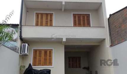 Casa com 3 quartos, 4 vagas de garagem, salão de festa, sacada 198m² no bairro Rubem Berta, Porto Alegre/RS