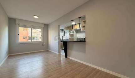 VENDA DE APARTAMENTO DE 2 QUARTOS COM SUÍTE E VAGA - MENINO DEUS