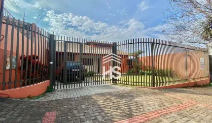 Terreno com 2 benfeitorias no Centro