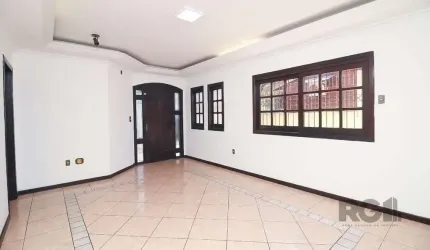 Casa à venda na rua Diana Terra, no bairro Marechal Rondon em Canoas. Casa térrea com 247 m² de área construída em um terreno de 327 m². Dispõe de 4 dormitórios, sendo 1 suíte, living, sala de jantar,