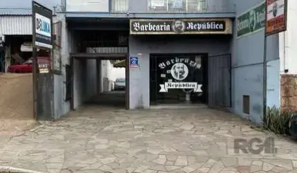 Prédio à venda na Avenida Bento Gonçalves, Partenon, Porto Alegre com duas entadas sendo uma pela rua Saldanha da Gama 700  Área privativa de 300m² e área total de 548m². 8 vagas de estacionamento 5 s