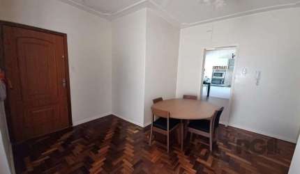 Apartamento Semi - mobiliado no Bairro Santana.&lt;BR&gt;   &lt;BR&gt;Excelente apartamento com 02 dormitórios, 62 m² privativos, living com 02 ambientes, cozinha ampla, área de serviço separada, banh