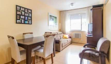 Apartamento no Bairro Passo da Areia - Oportunidade de Investimento!&lt;BR&gt;&lt;BR&gt;Vende-se apartamento de dois dormitórios, localizado no bairro Passo da Areia, com garagem, banheiro social, liv