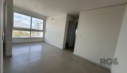 Apartamento com dois dormitórios  um suíte&lt;BR&gt; &lt;BR&gt;Apartamento composto por 2 dormitórios 1 suíte,  mobiliado , living em 2 ambientes, cozinha, sala de estar, sala de jantar, lavabo, área 