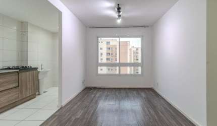 VENDA: Apartamento com 61 m² de área privativa , dois dormitórios, sendo um deles suíte, banheiro social, sala de estar, cozinha, área de serviço, churrasqueira e uma vaga de estacionamento não cobert