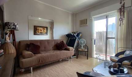 Apartamento com 2 dormitórios, living integrado para estar e jantar, sacada, cozinha funcional e vaga para 1 carro. Localizado na Rua Sete Povos, no Bairro Marechal Rondon, Canoas. O imóvel conta com 
