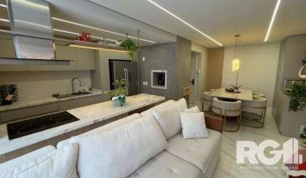 Belíssimo apartamento com 81m², suíte, lavabo, churrasqueira, finamente decorado por arquiteto, semimobiliado, mobília de ótima qualidade, piso laminado nos dormitórios e porcelanato nas áreas frias.