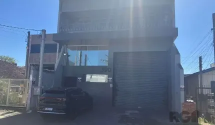 Oportunidade imperdível para investidores e empresários: galpão comercial desocupado à venda, no bairro Sarandi, Porto Alegre. Com 1.500 metros quadrados de área total, este imóvel é ideal para abriga