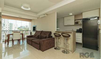Este encantador apartamento localizado no bairro Passo da Areia, 69m² de área privativa, espaço foi meticulosamente planejado para oferecer conforto e estilo. O living se divide em dois ambientes acon
