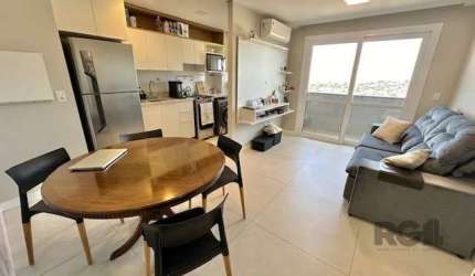 Lindo Apartamento mobiliado no Neo 360 para Comprar  no Bairro Petrópolis! O imóvel possui 1 suíte, lavabo, living para 2 ambientes, sacada, cozinha americana planejada e com churrasqueira, área de se