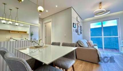 Apartamento novo a venda em Canoas, conta com 2 dormitórios, sala de estar e jantar integradas, cozinha e área de serviço. Condomínio possui elevador, piscina, salão de festas, quiosque com churrasque