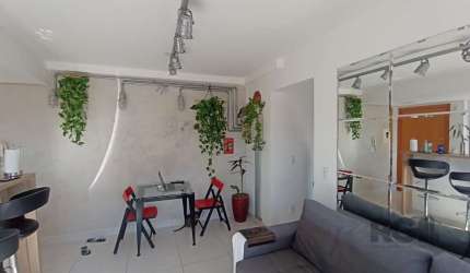 Apartamento de 2 (dois) dormitórios, 1 (uma) suíte, mobiliado, armários cozinha e dormitório suíte,  1 (uma) vaga de  garagem coberta, apartamento com churrasqueira,  banheiro social, localizado no Ba