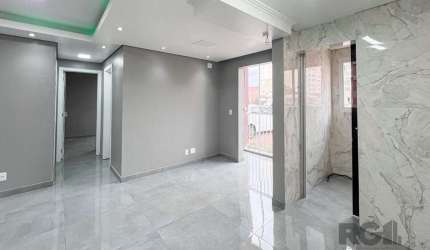 Descubra o seu novo lar no bairro Fátima, em Canoas, Rio Grande do Sul, com este incrível apartamento desocupado em condomínio fechado, à venda pelo melhor preço! Este imóvel contemporâneo, moderno e 