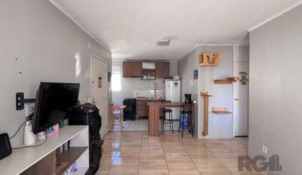 Descubra seu futuro lar no coração do Centro de Esteio, Rio Grande do Sul, em um condomínio fechado que oferece segurança e tranquilidade. Este apartamento em ótimo estado está disponível para venda a