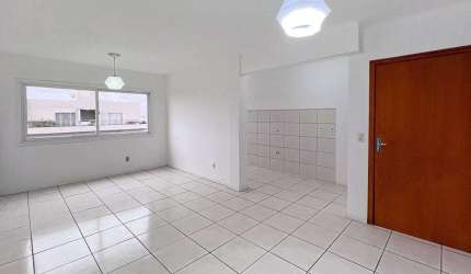 Descubra seu novo lar em Canoas! Apresentamos este encantador apartamento de 62 metros quadrados, localizado na Rua Doutor Alfredo Angelo Filho, no bairro Igara, em Canoas. Este espaçoso imóvel desocu