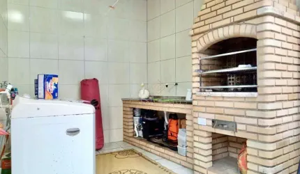 Casa com 3 dormitórios à venda, 90 m² por R$ 640.000,00 - Aviação - Praia Grande/SP