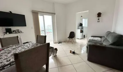 Apartamento com 2 dormitórios à venda, 63 m² por R$ 385.000,00 - Caiçara - Praia Grande/SP