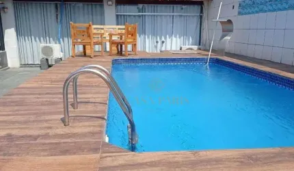 Casa com 3 dormitórios à venda, 360 m² por R$ 850.000,00 - Tude Bastos - Praia Grande/SP