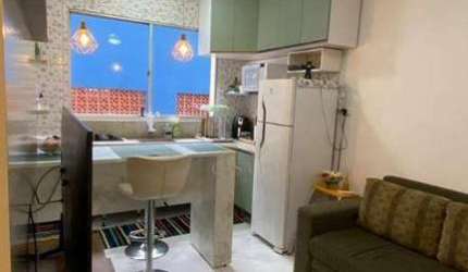 Apartamento com 2 dormitórios e 1 suíte à venda, 42 m² por R$ 290.000 - Mirim - Praia Grande/SP