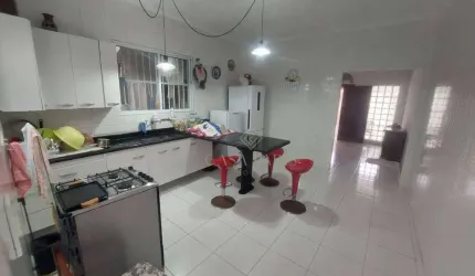 Casa com 2 dormitórios à venda, 114 m² por R$ 550.000,00 - Caiçara - Praia Grande/SP
