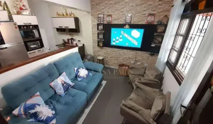 Casa com 2 dormitórios à venda, 80 m² por R$ 425.000,00 - Caiçara - Praia Grande/SP