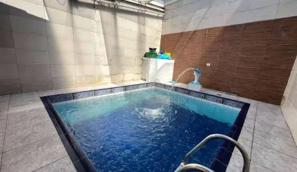 Casa com 2 dormitórios à venda, 82 m² por R$ 495.000,00 - Aviação - Praia Grande/SP