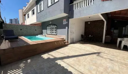 Sobrado com 3 dormitórios à venda, 130 m² por R$ 750.000,00 - Ocian - Praia Grande/SP