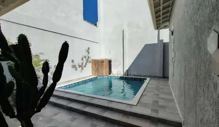Casa com 4 dormitórios à venda, 127 m² por R$ 1.739.000,00 - Caiçara - Praia Grande/SP
