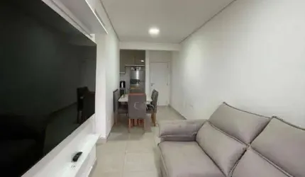 Apartamento com 2 dormitórios à venda, 65 m² por R$ 550.000,00 - Canto do Forte - Praia Grande/SP