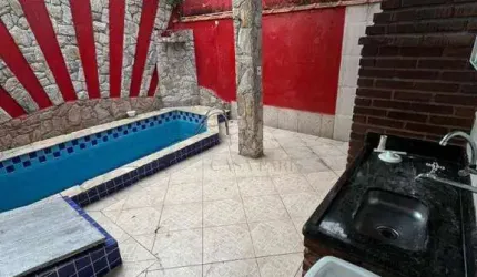 Casa com 3 dormitórios à venda, 165 m² por R$ 615.000,00 - Caiçara - Praia Grande/SP