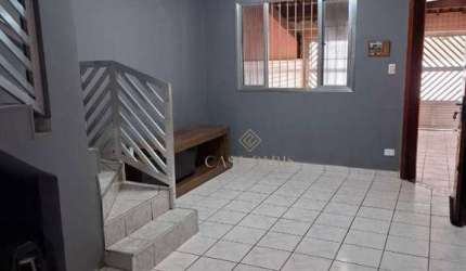Casa com 2 dormitórios à venda, 117 m² por R$ 580.000,00 - Vila Guilhermina - Praia Grande/SP